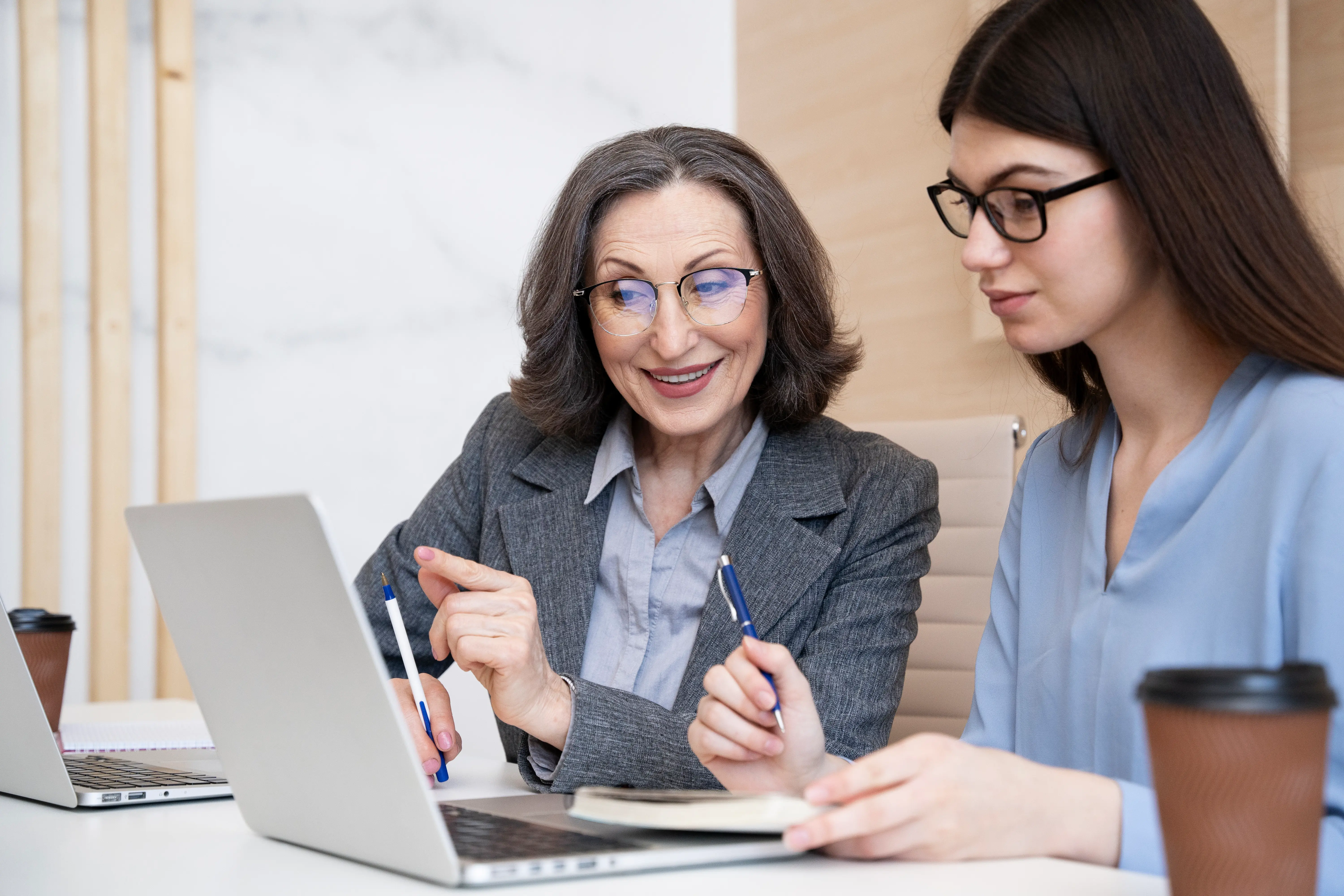 Tutor guiding a student